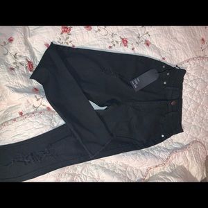 Fashion nova mid /high rise, ripped black jeans
